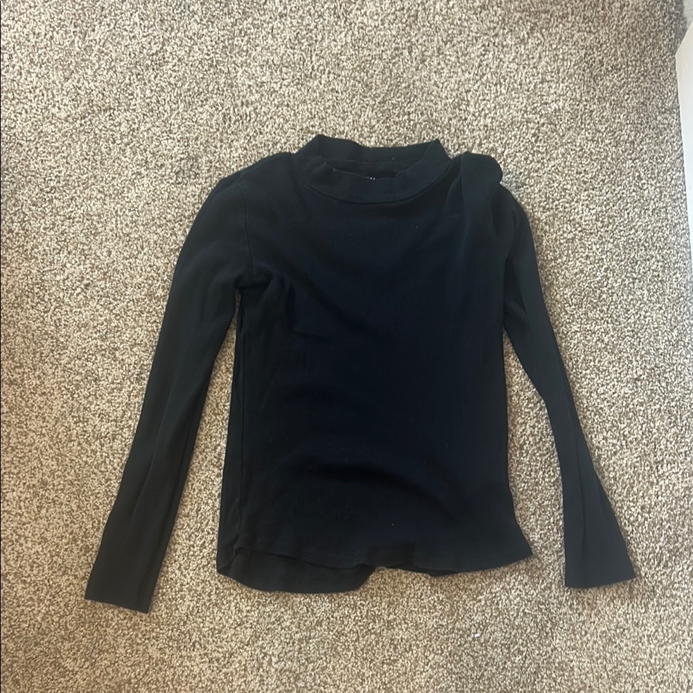 Black tight, long sleeve kid shirt